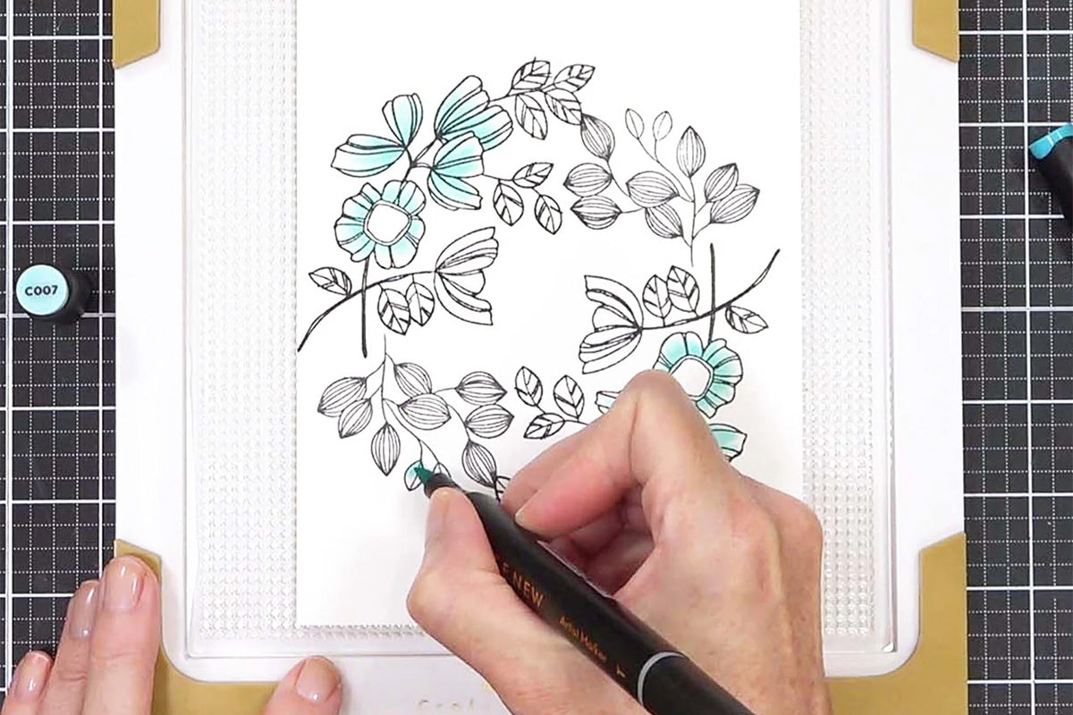 Coloring in a wreath card with the help of the Stick Mat and platform from Altenew's Ultimate Stampwheel & Accessories Bundle