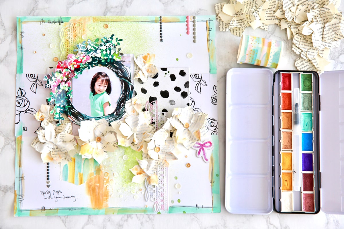 Metallic watercolors and washi tapes on a scrapbook layout
