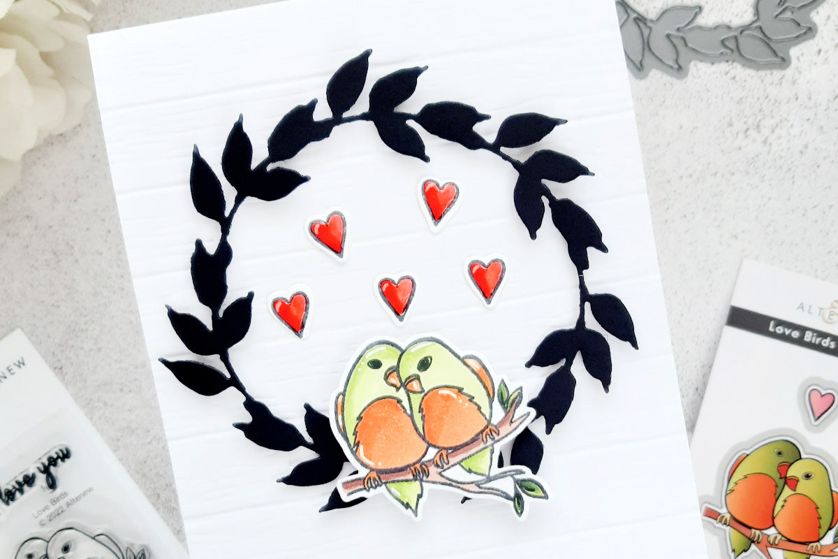 Cute Valentine's Day card idea with a wreath design and cute lovebirds