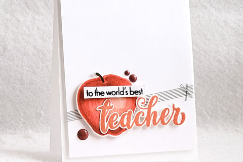 andmade minimalist card idea for Teacher's Day, with an apple image and the sentiment "to the world's best teacher"