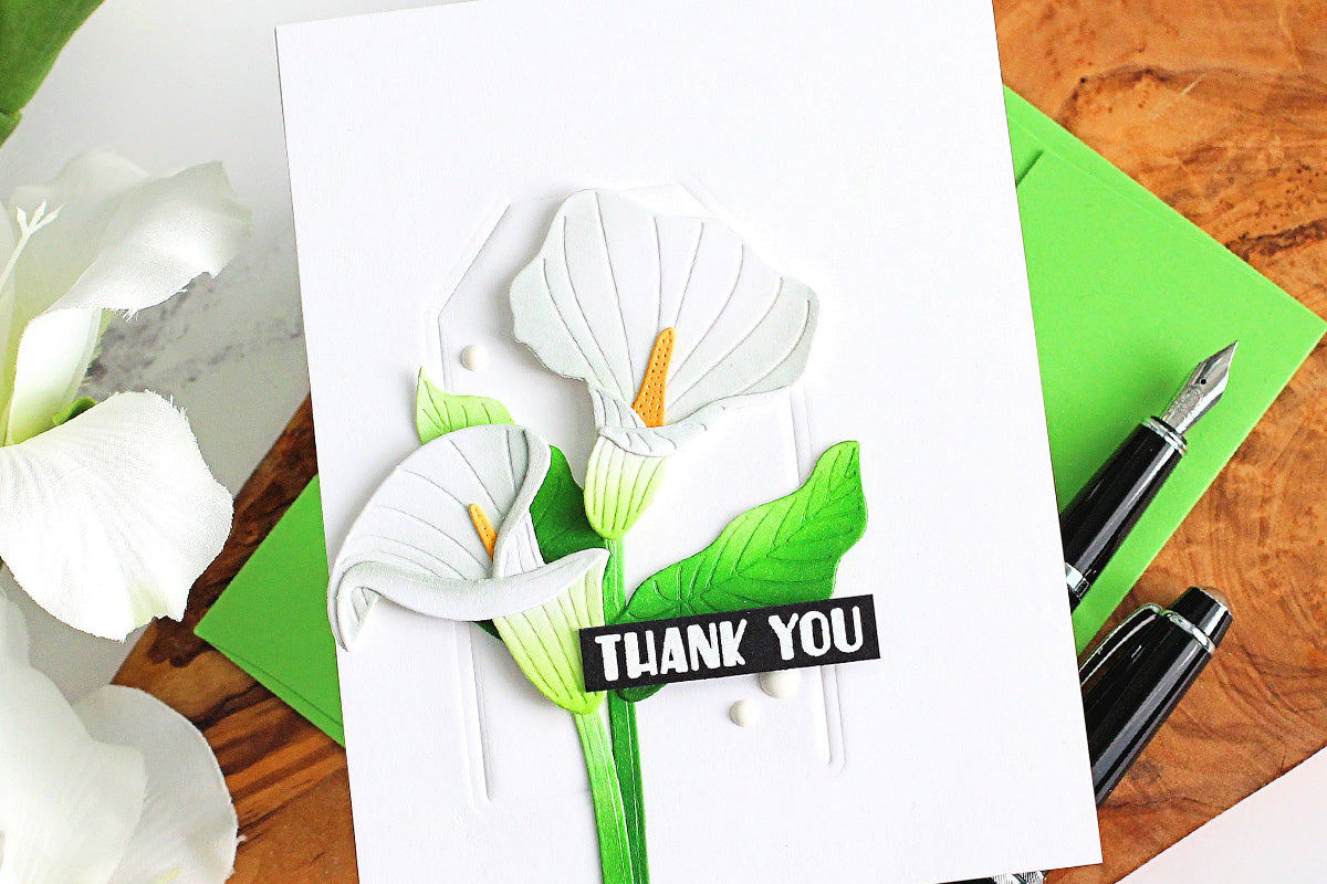 Minimalist thank you card design with white flowers and a debossed background