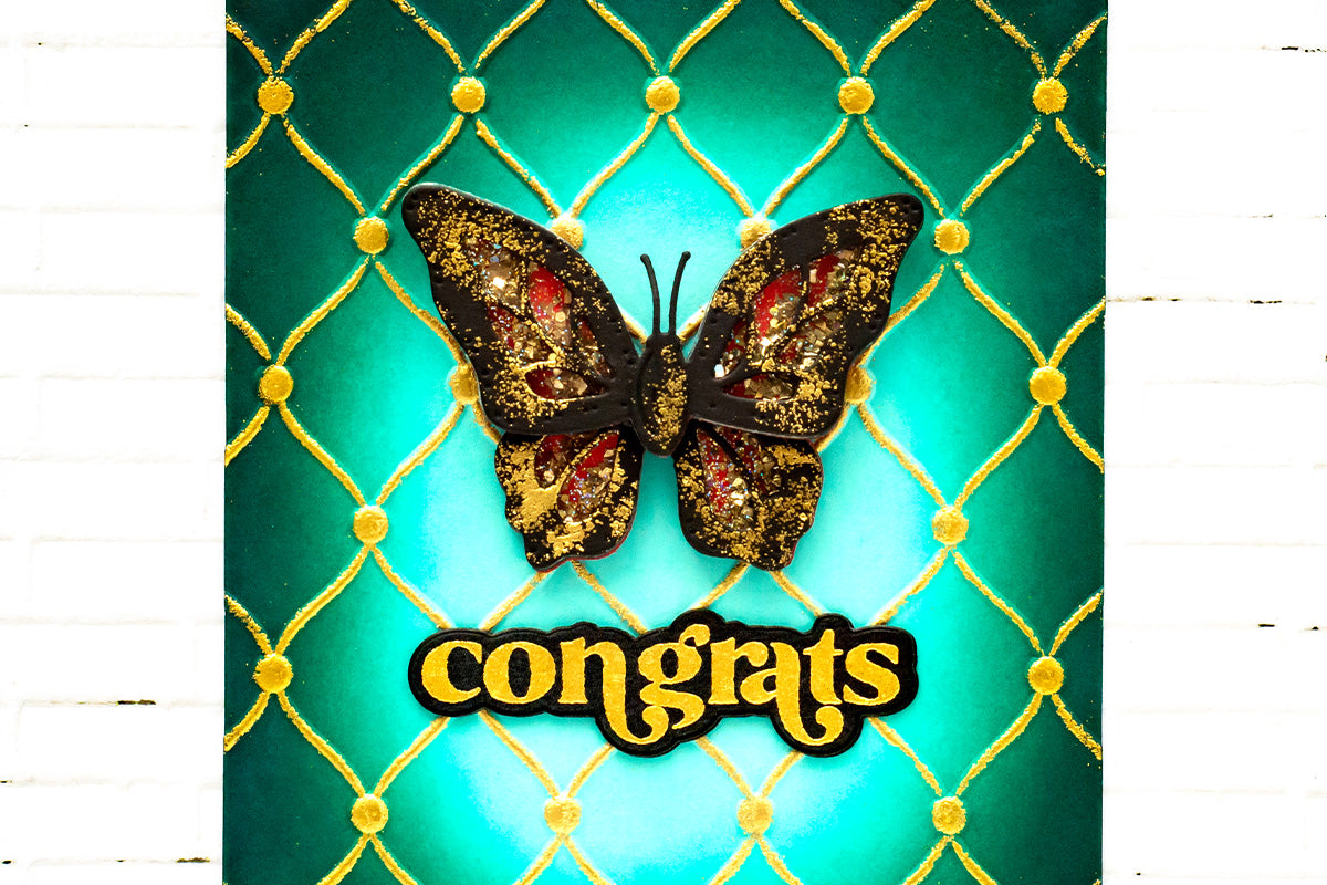 A congratulatory card with a gorgeous green background and a beautiful butterfly element in the center