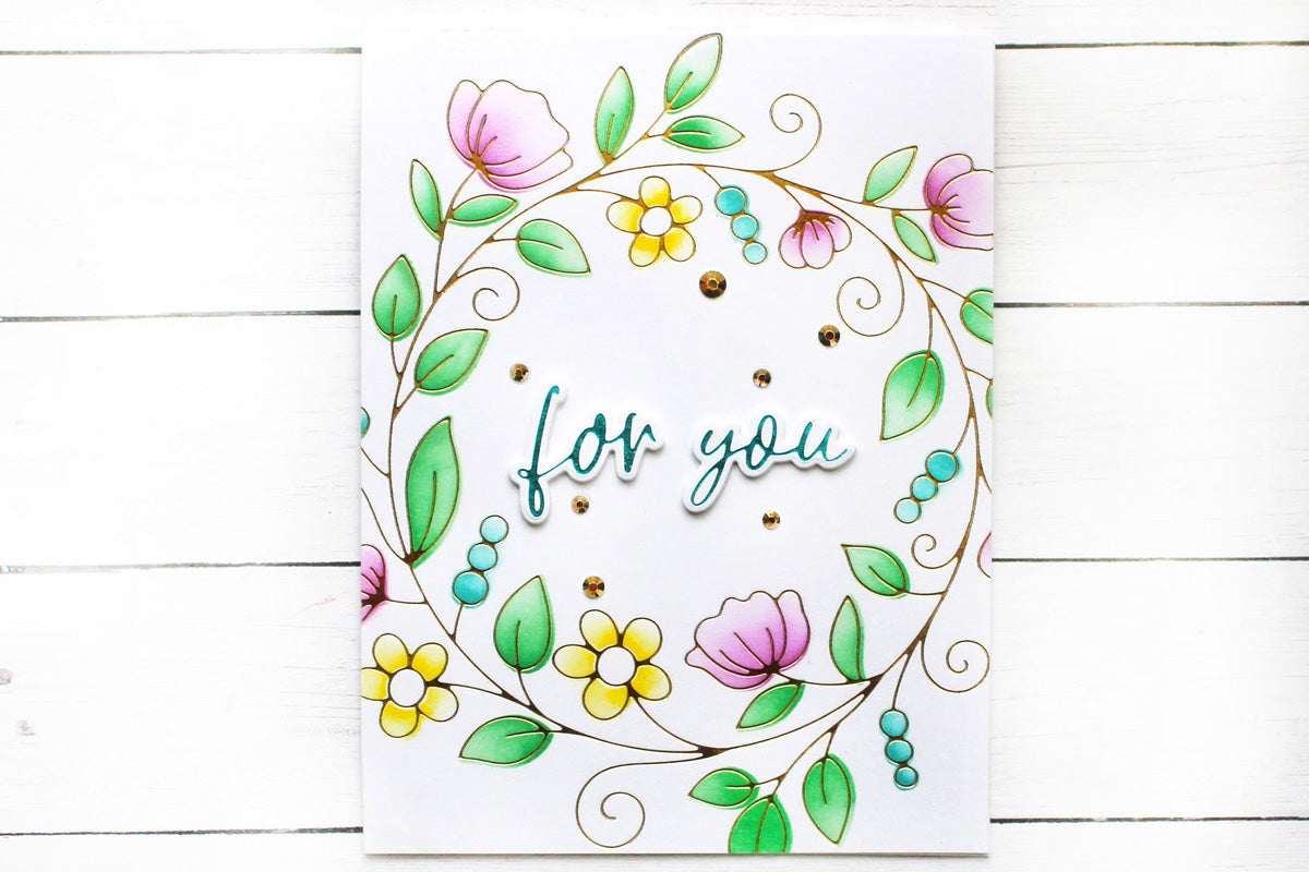 A "For You" card designed with a decorative wreath created through hot foiling