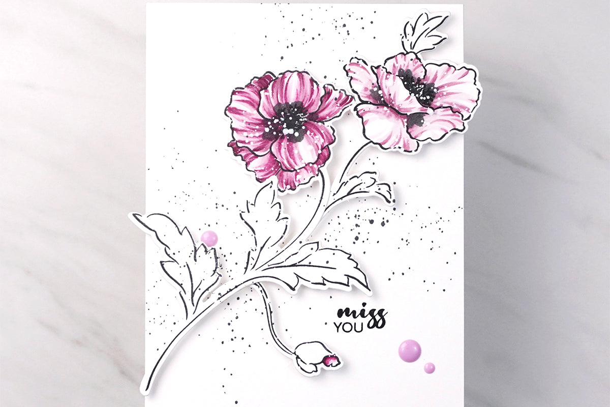 Clean and simple miss you card with floral die-cuts colored in with alcohol markers