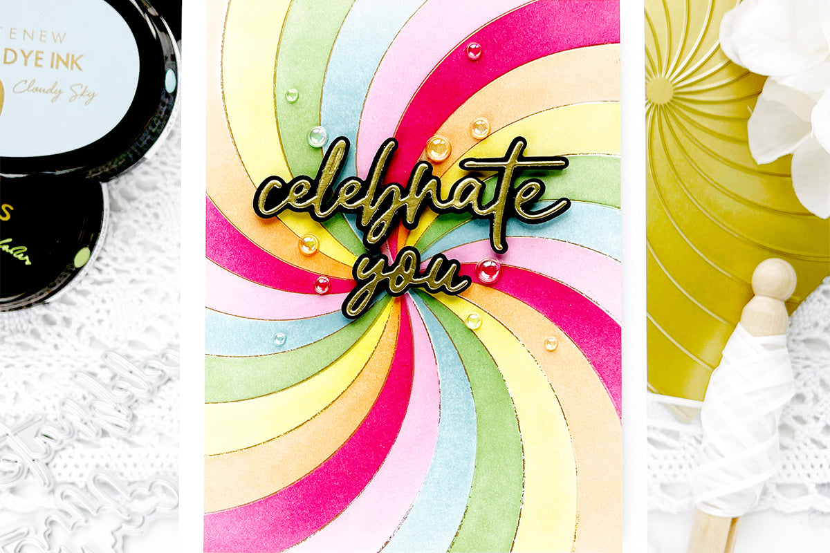 Rainbow themed celebration themed card with gold foiled background