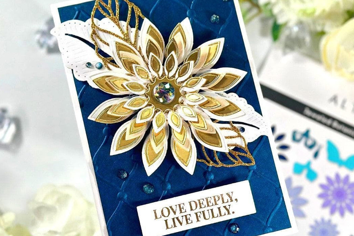A blue background card with an ornate golden flower as focal point, created with sentiments from the One-Go: Loving Sentiment Stamp Set using the One-Go Paper Crafting System