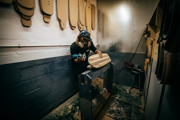 Kingdom Boards handcrafted skateboard and longboard shaping bay