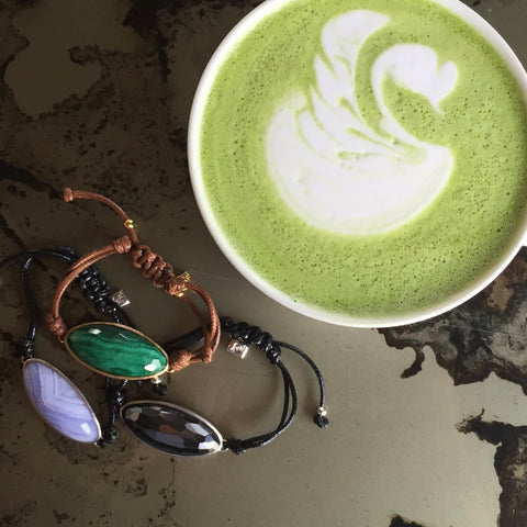 Lattice Corded Friendship Bracelets in Natural stones on marble table next to Matcha Latte