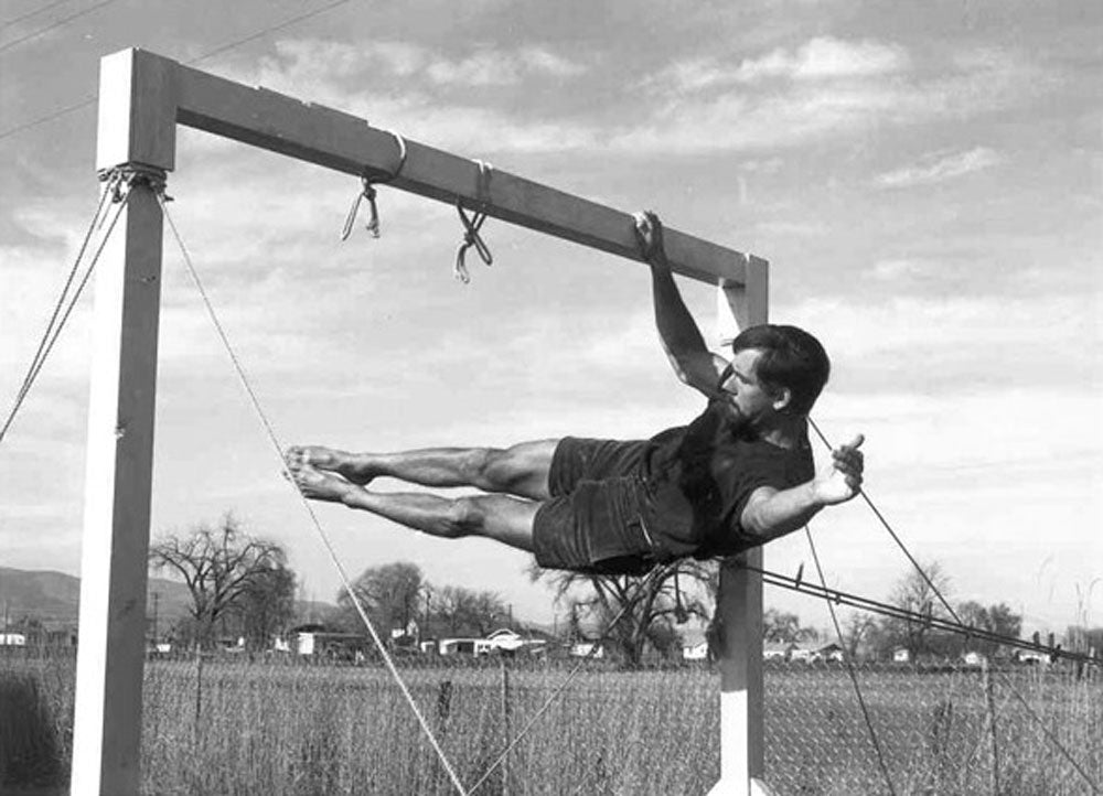 John Gill, performing a one arm front lever in the late 1960s. Gill is known for his applications of gymnastics to rock climbing.