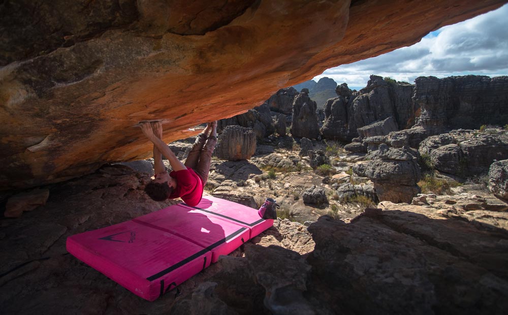 Joe Swales bouldering on an overhang in Rocklands, South Africa