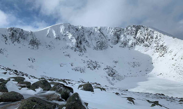 snowy and icey mountain range and rock climbing area in the cairngorms