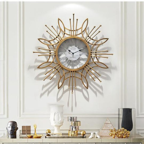 Large Golden Metal Circular Quartz Wall Clock With Needle Display, Abstract Pattern, Has 30mm Thick Plate, Single Face Form, Of Size 79.5x79.5x3.5cm/31.3x31.3x1.4inch Is Powered By: AA 1.5V Battery, available exclusively on Shahi Sajawat India,the world of home decor products.Best trendy home decor, living room and kitchen decor ideas of 2019.