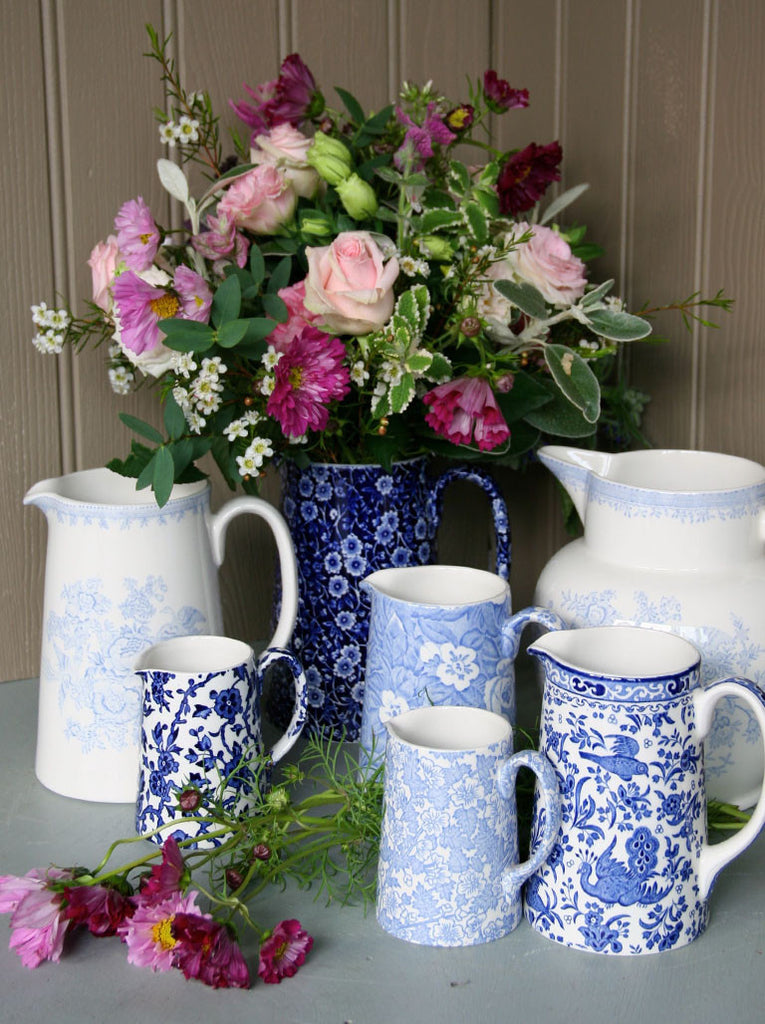 Blue and White Burleigh jug filled with seasonal flowers. Courier ...