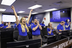 Members of the DART team celebrate on Sept. 26, 2022, as images livestreamed from the spacecraft show it successfully impacted the asteroid Dimorphos, completing the world’s first planetary defense test mission. Credit: Johns Hopkins APL/Ed Whitman