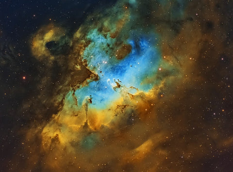 The Eagle Nebula in the Hubble Palette narrowband filters by Chuck Ayoub with his Explore Scientific ED127 Essential Series Refractor