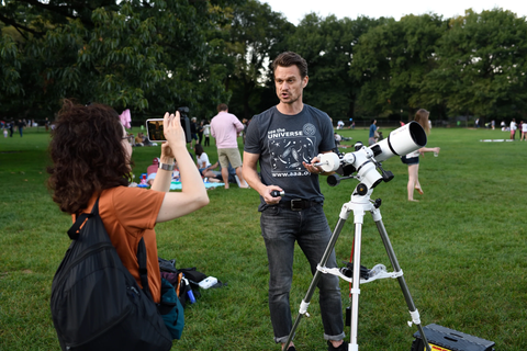 Matthias Schmitt at an astronomy outreach event. 