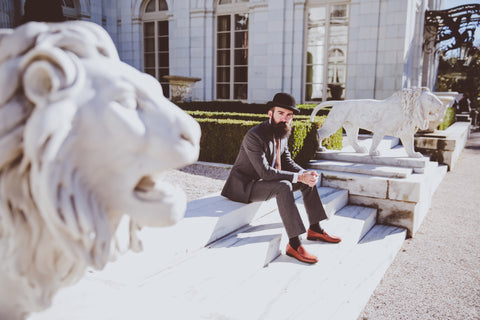 The Beard Baron dressed in a suit and bowler.