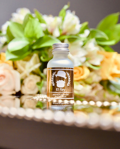 El Rey Premium Beard Oil on mirror with roses