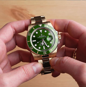 rolex submariner gold green dial