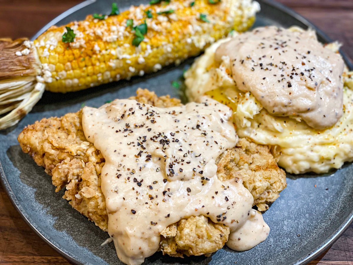 Chicken Fried Steak with Smashed Potatoes & Cracked Pepper Gravy Meat