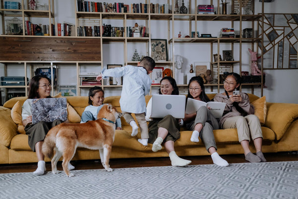 A Happy Family Sitting on the Couch