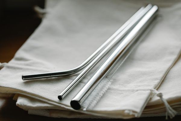 A set of reusable stainless straws