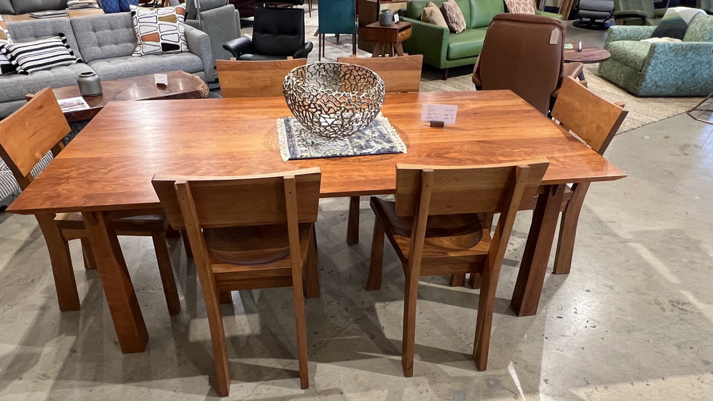 Enso solid dining table and chairs at TY Fine Furniture showroom