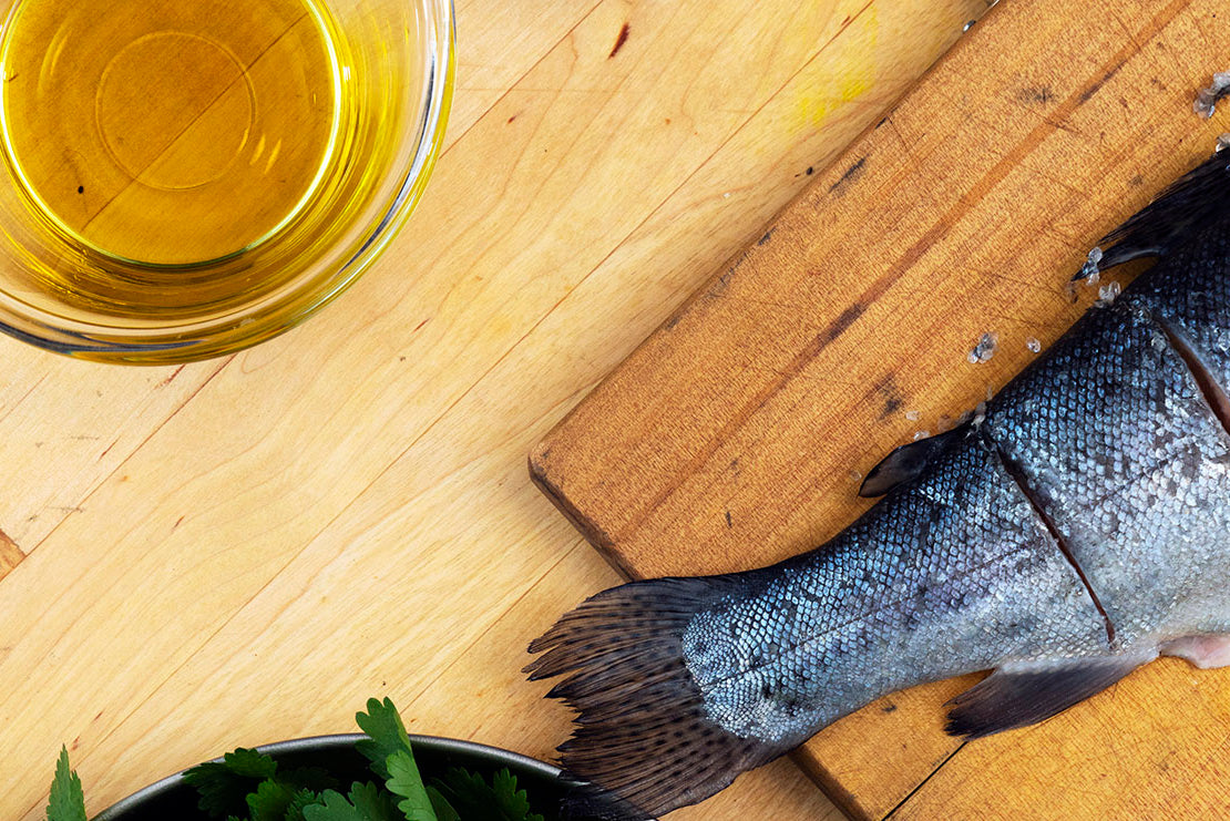 Coat the fish in olive oil and season with salt and pepper
