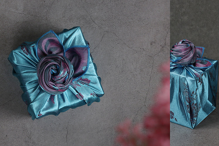 You can take the azure and silver Korean Bojagi wrapping cloth and make any gift look gorgeous, but adding a delicate handmade knot at the top looks even more stunning.