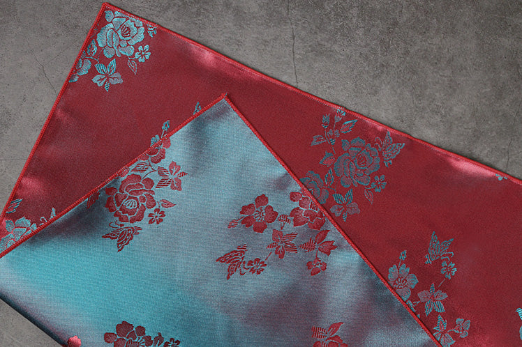 The dark teal and wine colors really make the floral design more eye-catching and it adds a stunning touch to the fabric gift wrap.