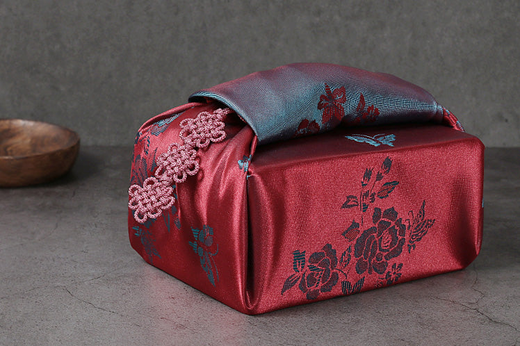 Warm energy and love emanate from this dark crimson and light cyan gift wrapping cloth and it's one of many Bojagi for sale on our website.