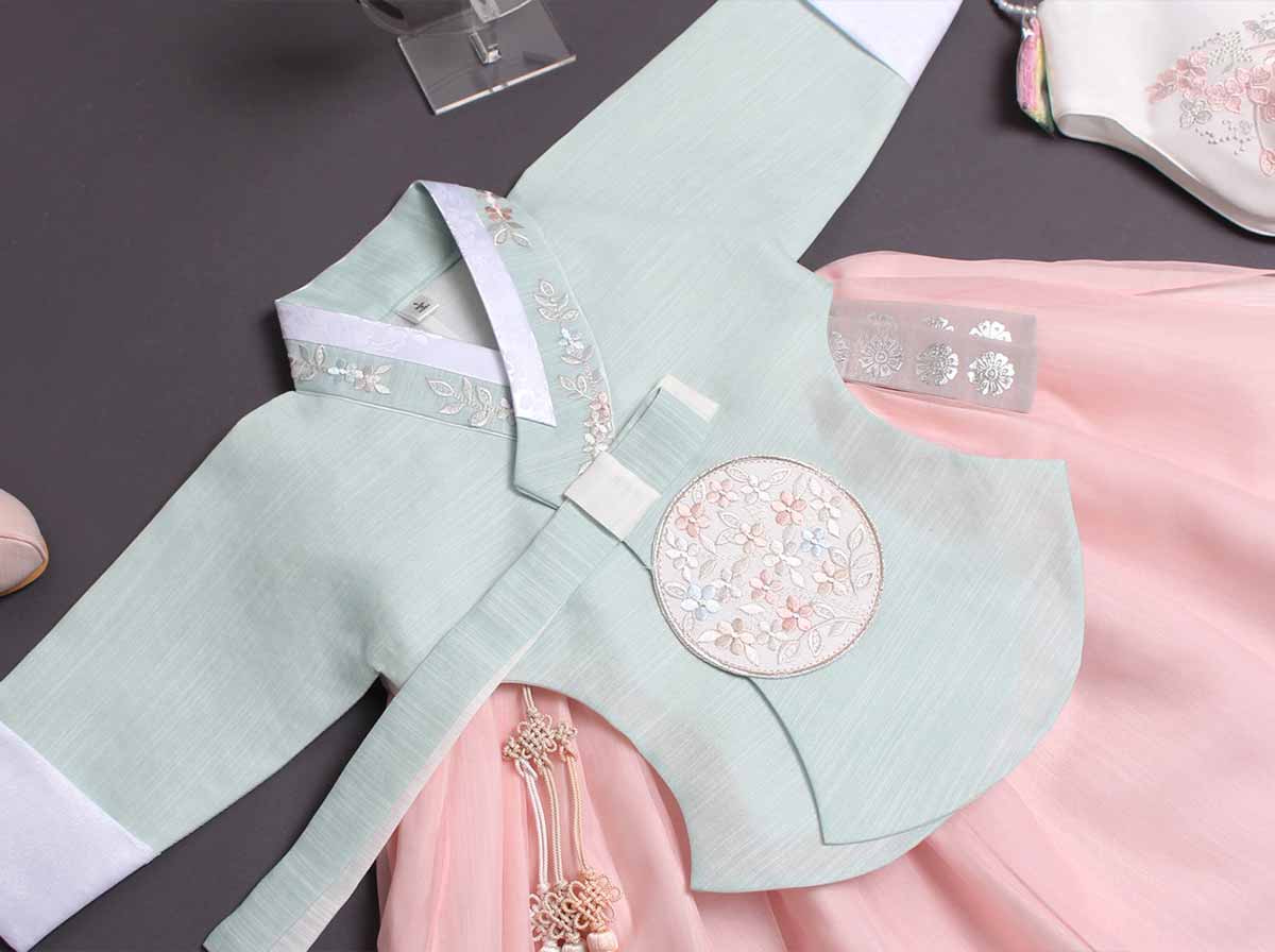 An up close look at the baby girl hanbok in azure and blush and you can see the detail and quality very well.