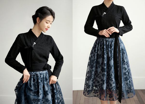 Add a touch of Korean heritage anywhere you go with this dark black check modern hanbok blouse.