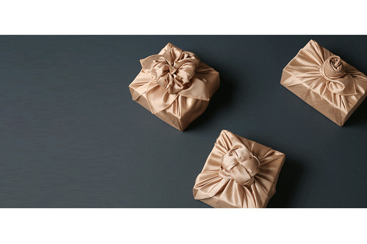 The sand colored Bojagi art makes a prime reusable gift wrap choice for anniversaries.