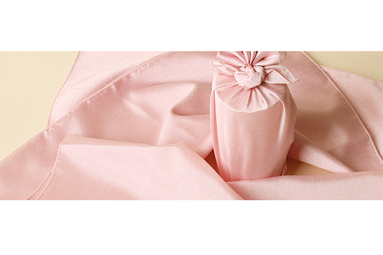 The coral single sided Korean Bojagi is an exquisite fabric wrapping cloth for a baby shower.