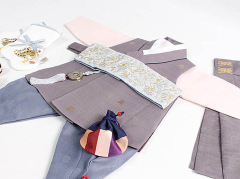 The baby boy hanbok in dark gray is not only visually very appealing, but it also is traditionally Korean.