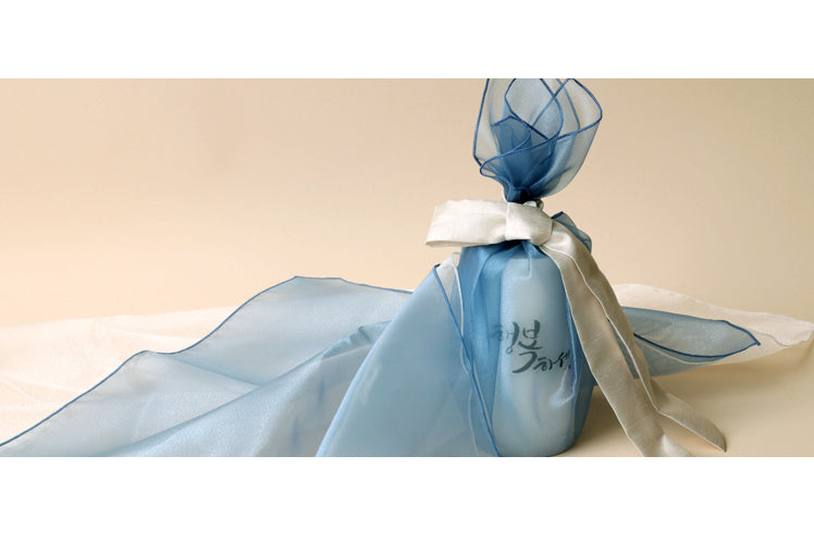 Teal lucid Korean Bojagi can really dress up your anniversary or Parent's Day event. It's reusable gift wrap that will bring joy to all who see it.