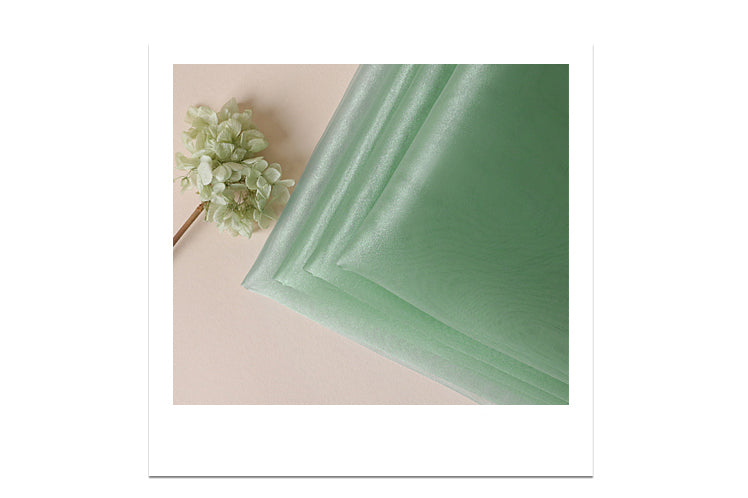The thin material makes this teal colored Bojagi Korean gift wrap perfect for delicate gifts.