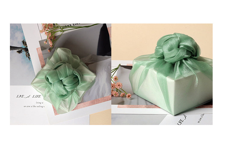 Fancy bows on top of this aqua lucid Korean wrapping cloth Bojagi look chic and it's perfect for men and women.