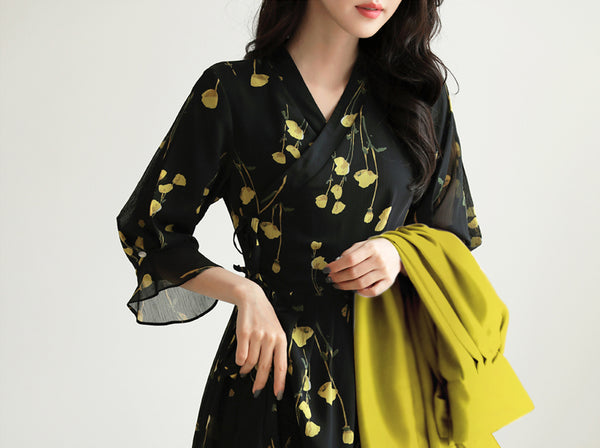 Add an element of Korean tradition with this raven and amber modern hanbok dress in flower print.