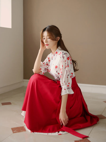 You'll feel the love and energy when you wear this off-white and vermilion rose modern hanbok dress for sale on Joteta.