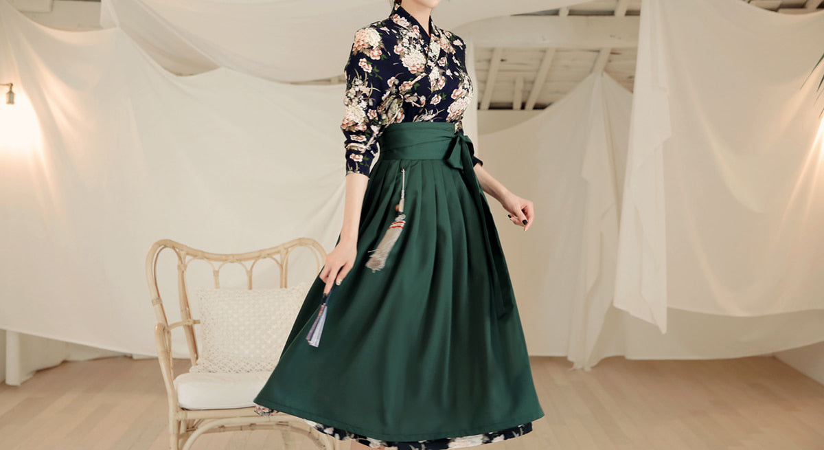 Perfect for everyday wear, this deep sea blue flower modern hanbok dress is comfortable and stylish.