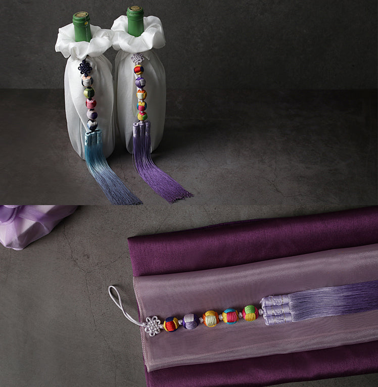 Creative and colorful are two ways you can describe the Five Elements Trio Tassel.