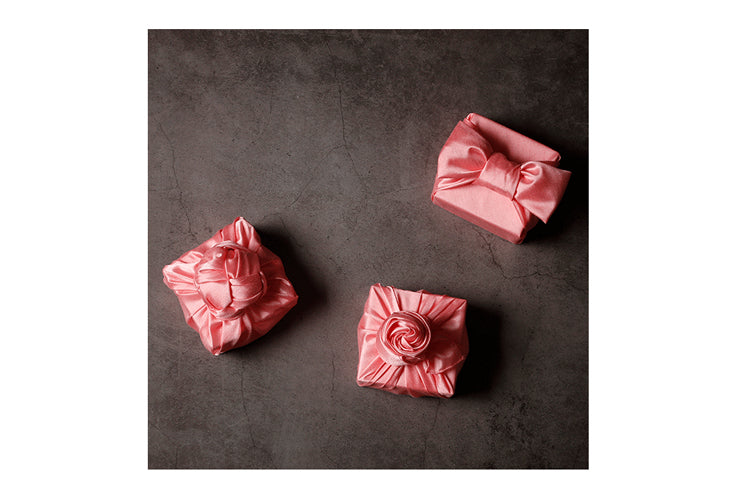 Bold and dreamy, this neon pink Bojagi is going to stand out even among other presents that use Korean gift wrapping cloth.