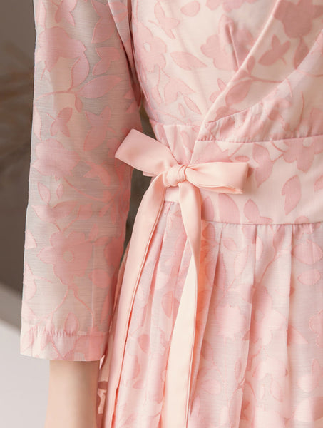 An up-close look at the floral print on this rose modern hanbok dress for sale.