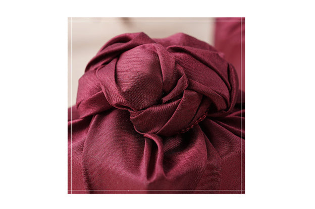 The ruby colored Bojagi Art is a classic and iconic color if you're looking for fabric wrapping cloth for boys or girls.