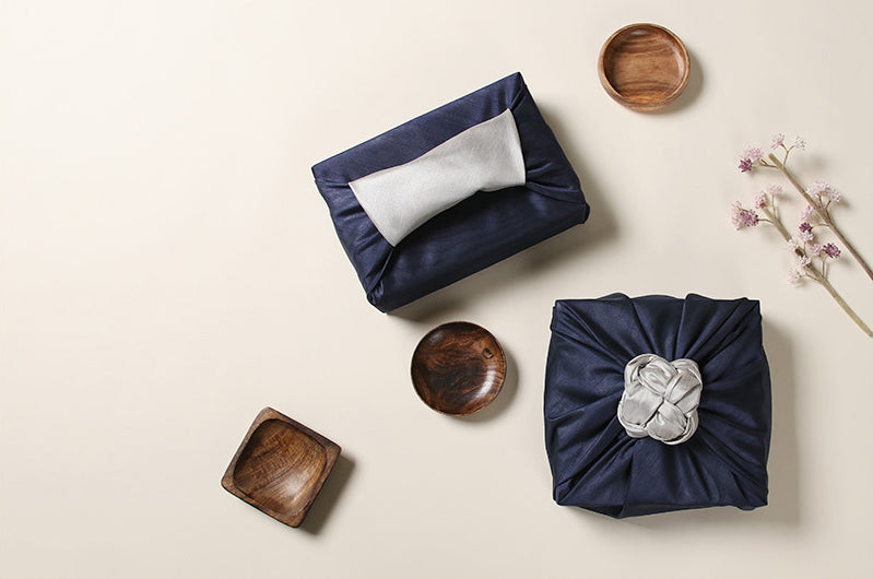 The top view of this azure and cream Korean wrapping cloth Bojagi shows you how easy wrapping presents with fabric is, even when the gift is odd-shaped.