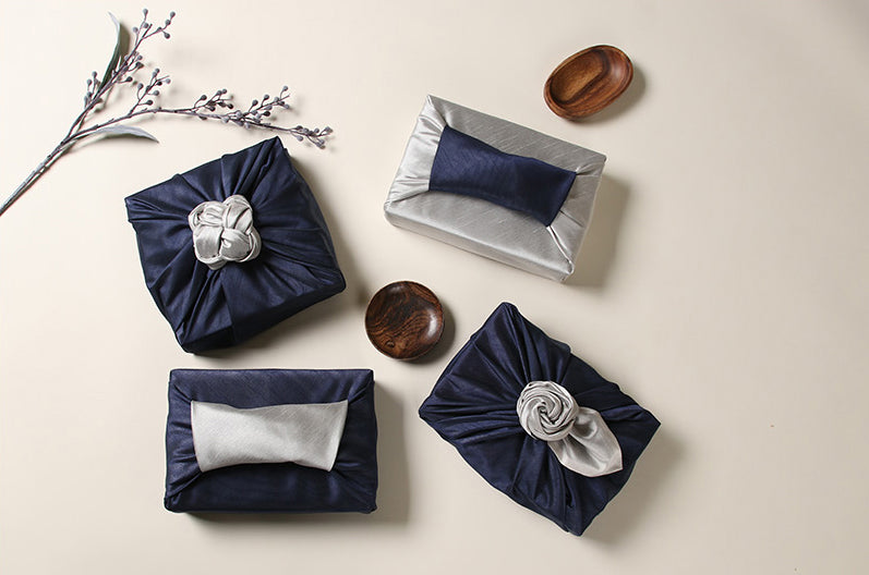 Decorate any formal or semi-formal celebration with the sapphire and achromic Korean Bojagi wrap.