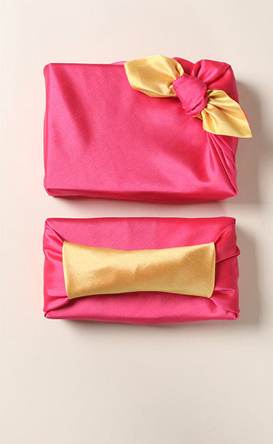 The fuchsia and tawny Korean fabric wrap adds a nice touch to any Christmas or birthday gift.