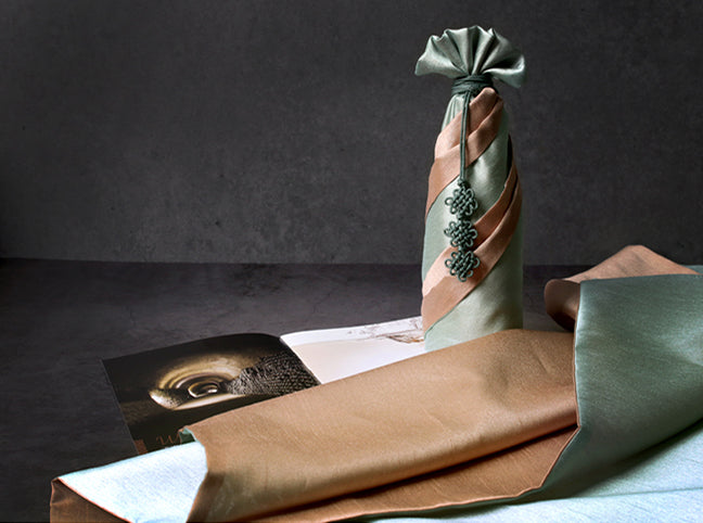 Awkward-shaped presents are no match for this moss and light brown Korean Bojagi, and it really brings a splendid look to anything wrapped in this fabric wrapping paper.